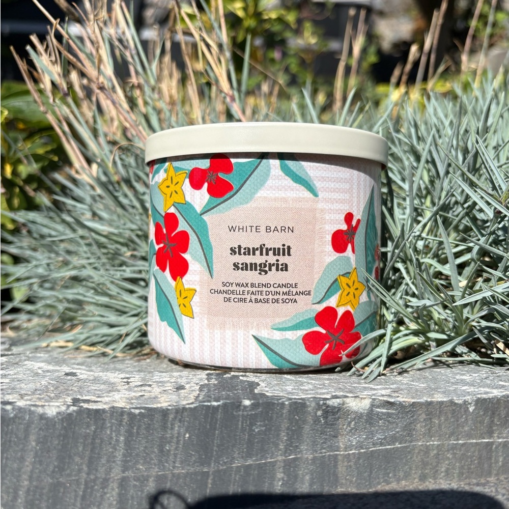 White Barn Starfruit Sangria Candle with Red and Yellow Floral Design